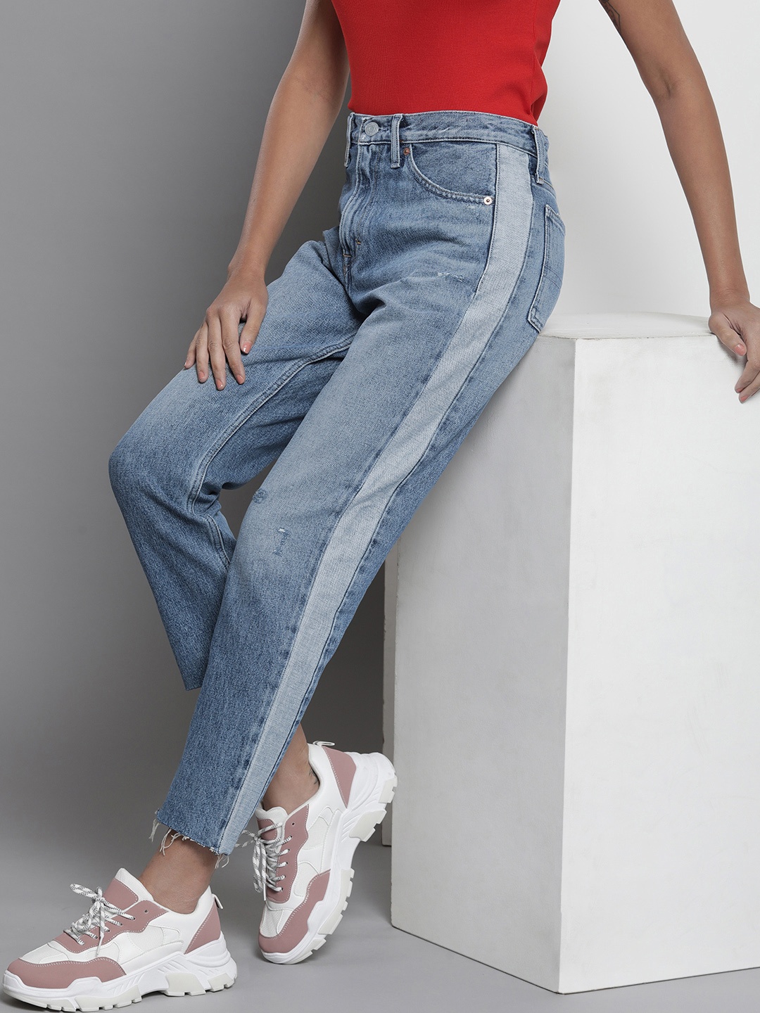 

Tommy Hilfiger Women Slim Fit High-Rise Low Distress Stretchable Jeans with Side Stripe, Blue
