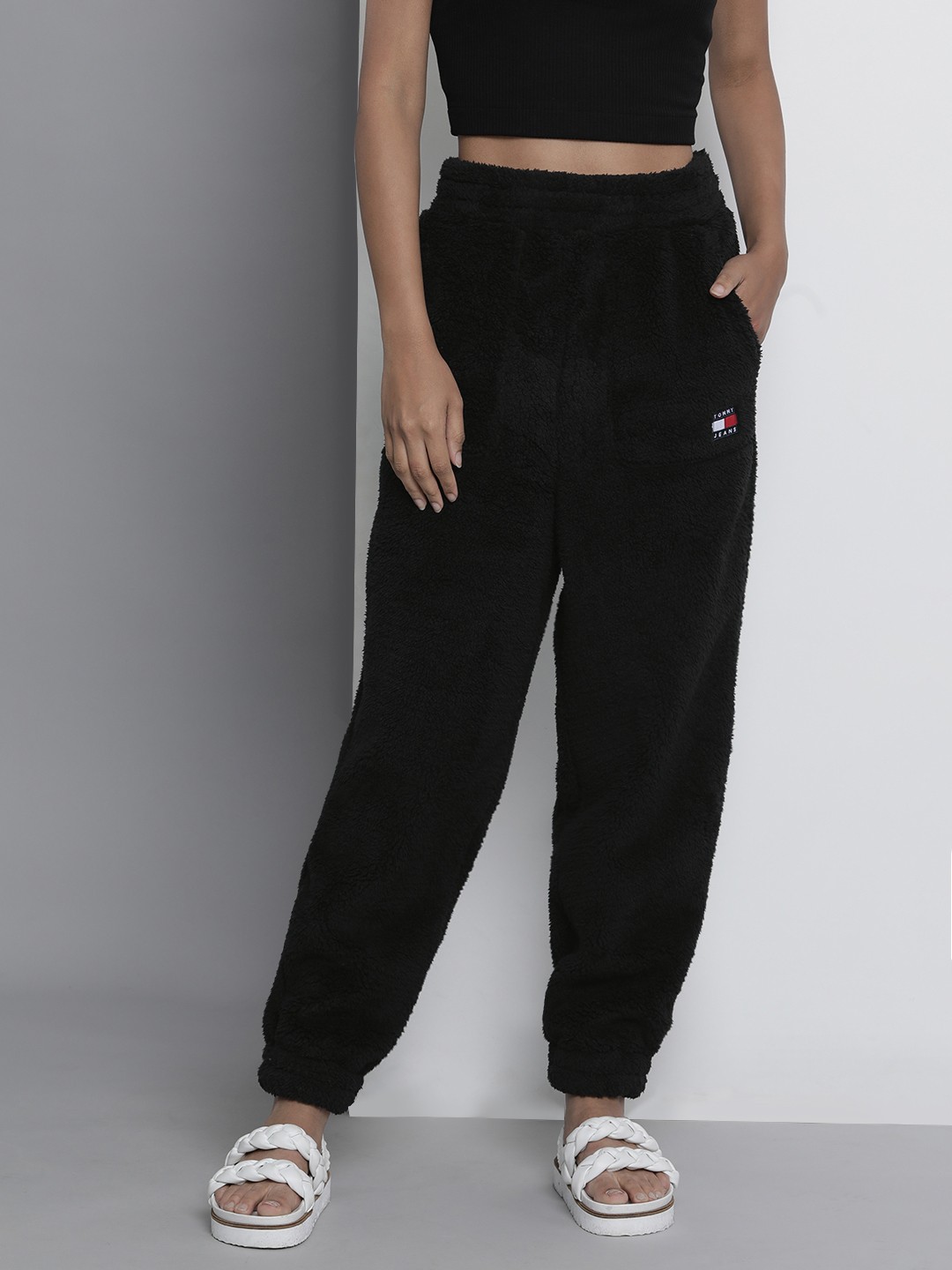 

Tommy Hilfiger Women Black Solid Plush Badge Sweatpants