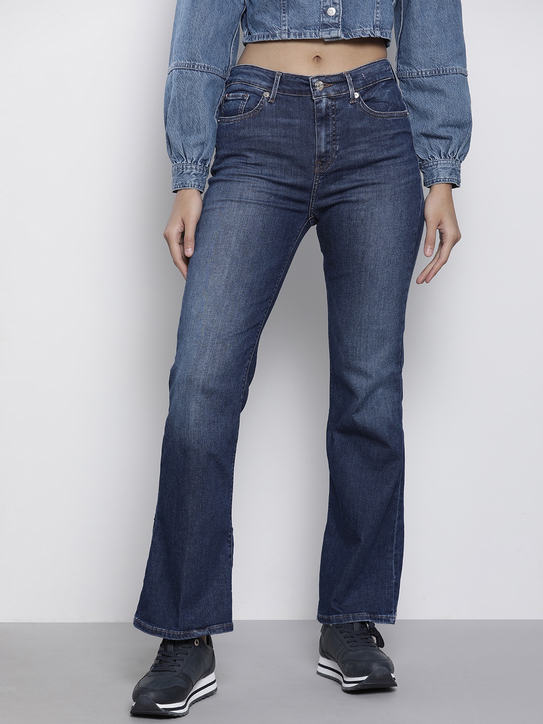 

Tommy Hilfiger Women Blue Bootcut Mid Rise Light Fade Stretchable Jeans