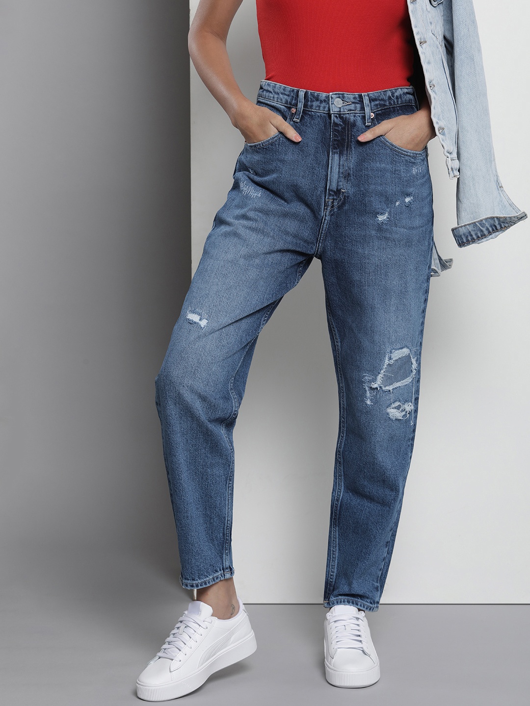 

Tommy Hilfiger Women Mom Fit High-Rise Mildly Distressed Light Fade Stretchable Jeans, Blue