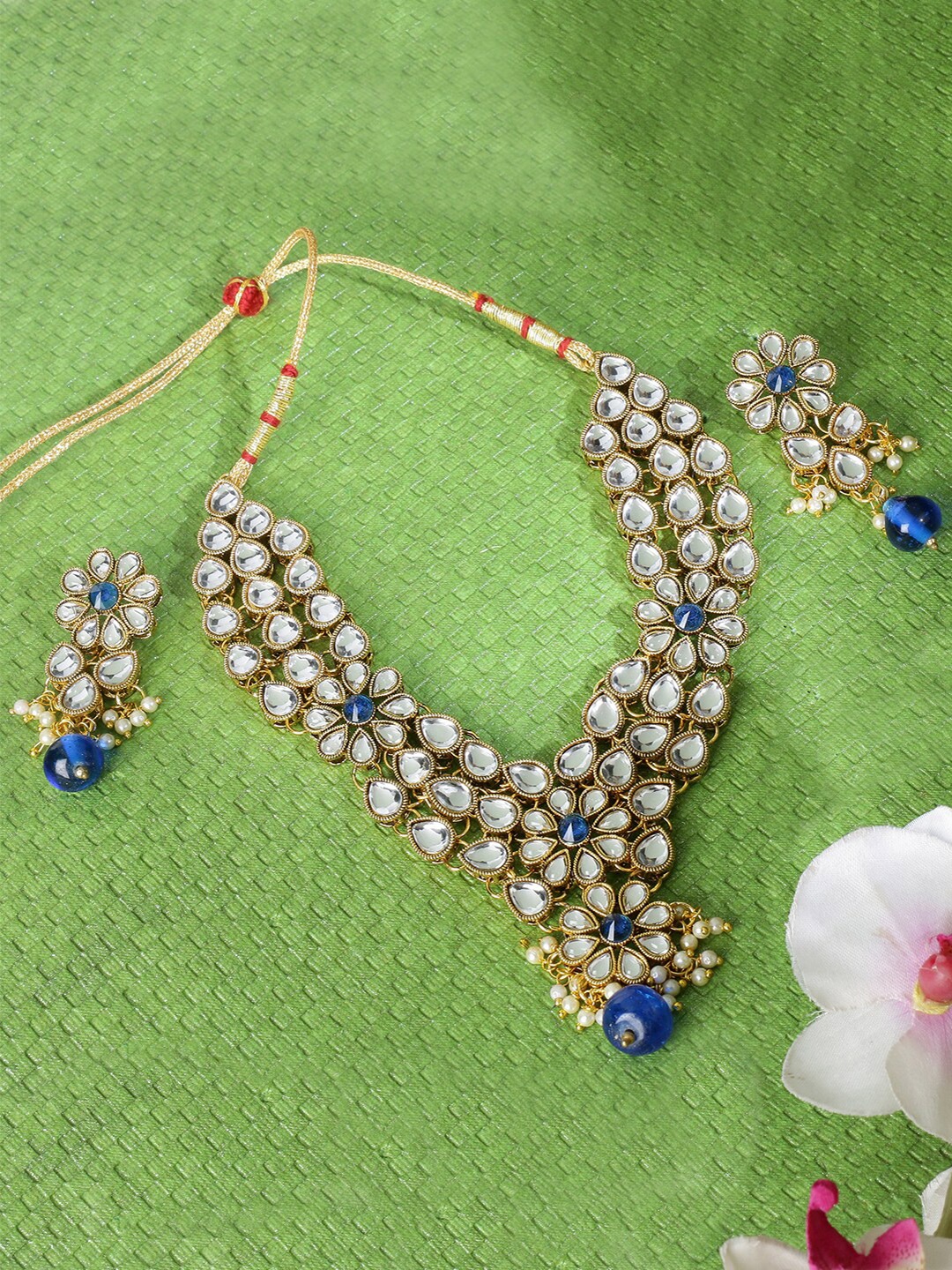 

LIVE EVIL Blue & Gold-Toned Kundan Stone Studded Jewellery Set