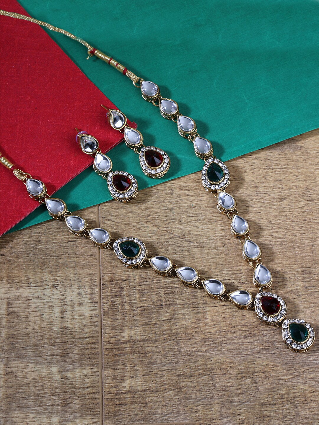

LIVE EVIL White & Green Gold-Plated Kundan Studded Jewellery Set