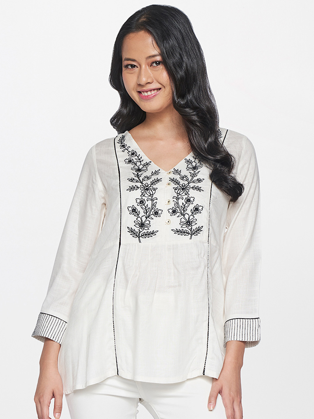 

Global Desi Women Off White Ethnic Motifs Embroidered V-Neck Regular Top