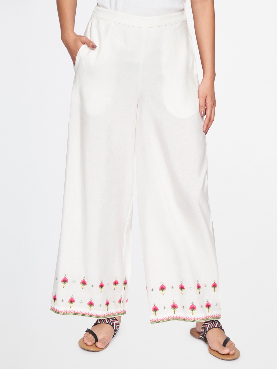 

Global Desi Women White Floral Embroidered Ethnic Palazzos