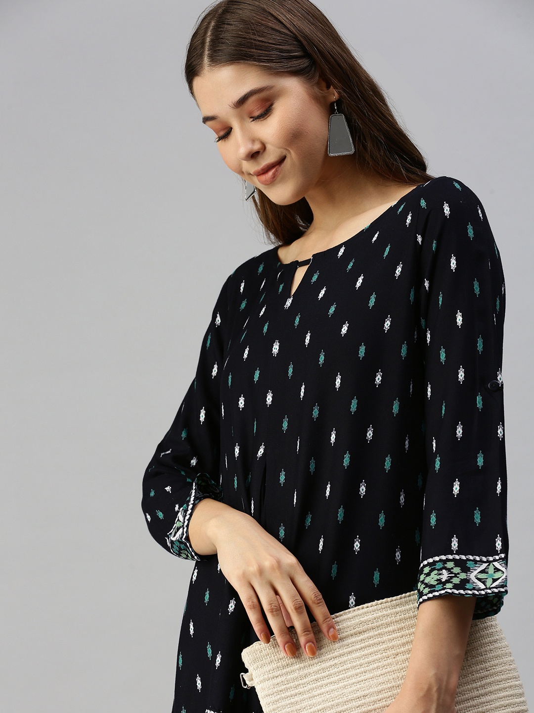 

Global Desi Women Navy Blue & White Print Keyhole Neck Top