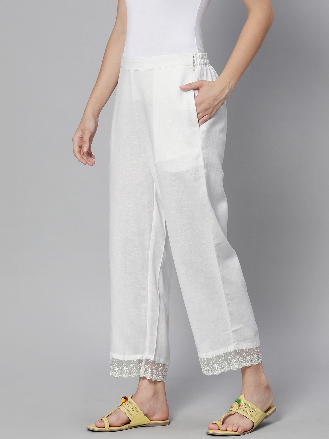 

Global Desi Women White Solid Regular Trousers