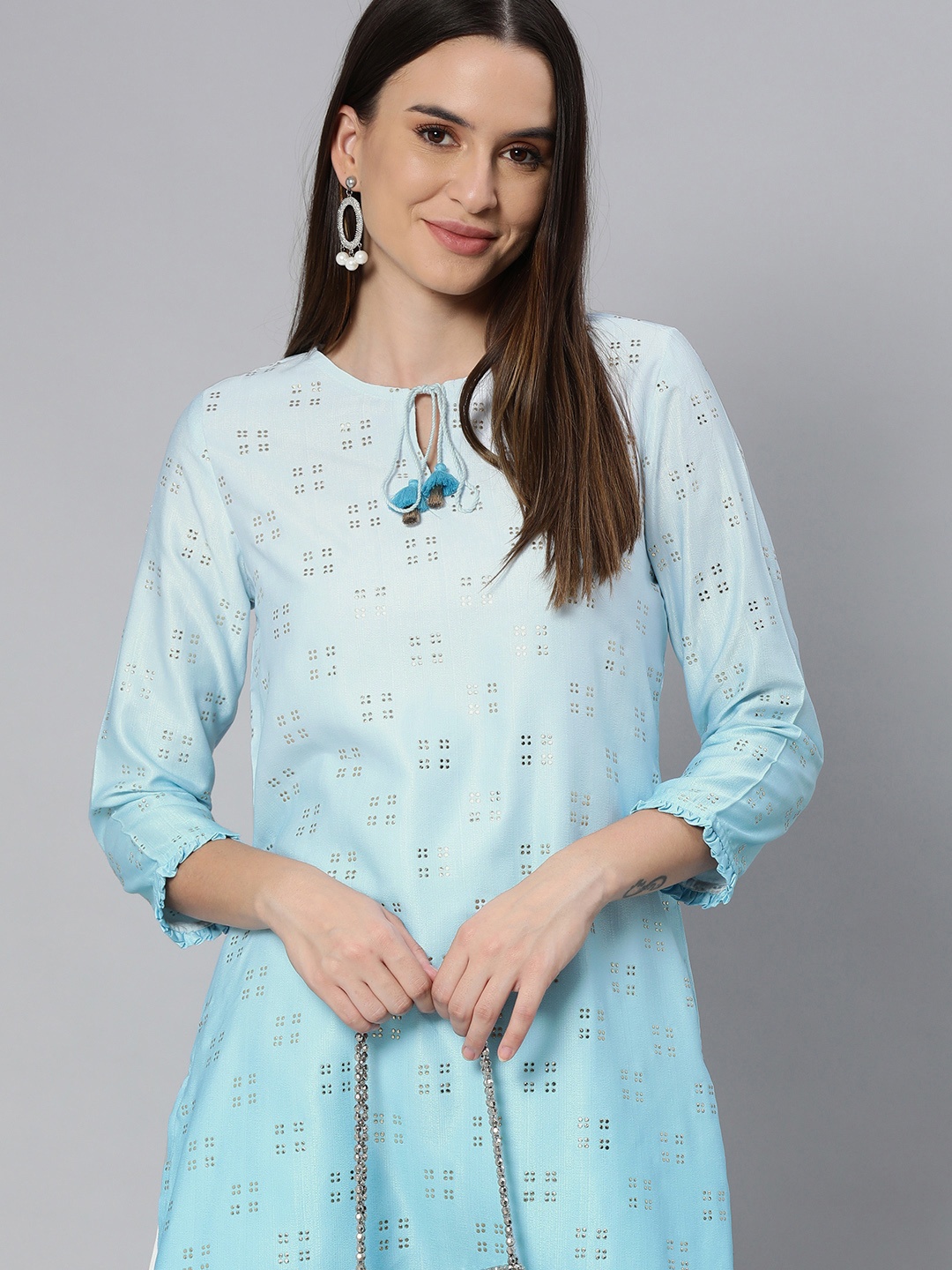 

Global Desi Women Light Blue Tie-Up Neck Woven Design Kurta