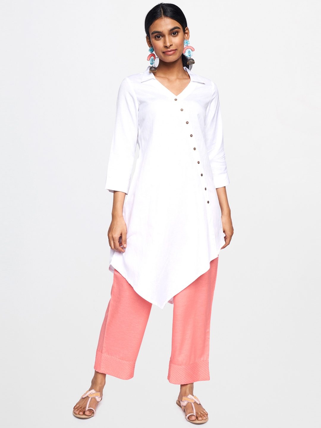 

Global Desi Women White Solid Tunic