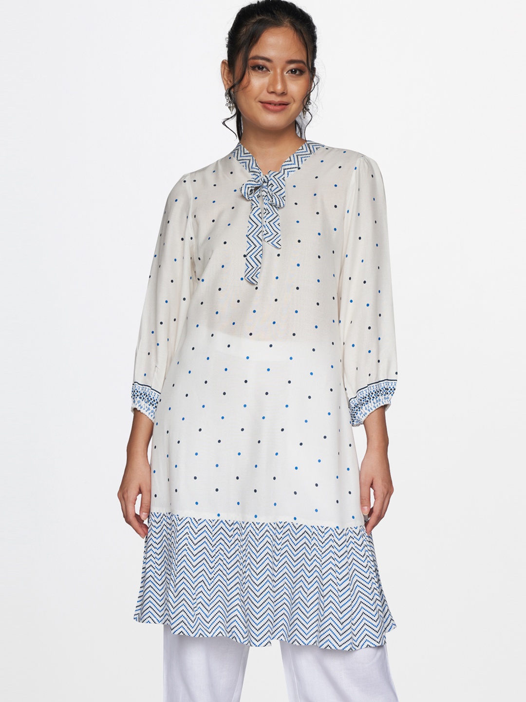 

Global Desi Women White & Blue Printed V Neck Tunic