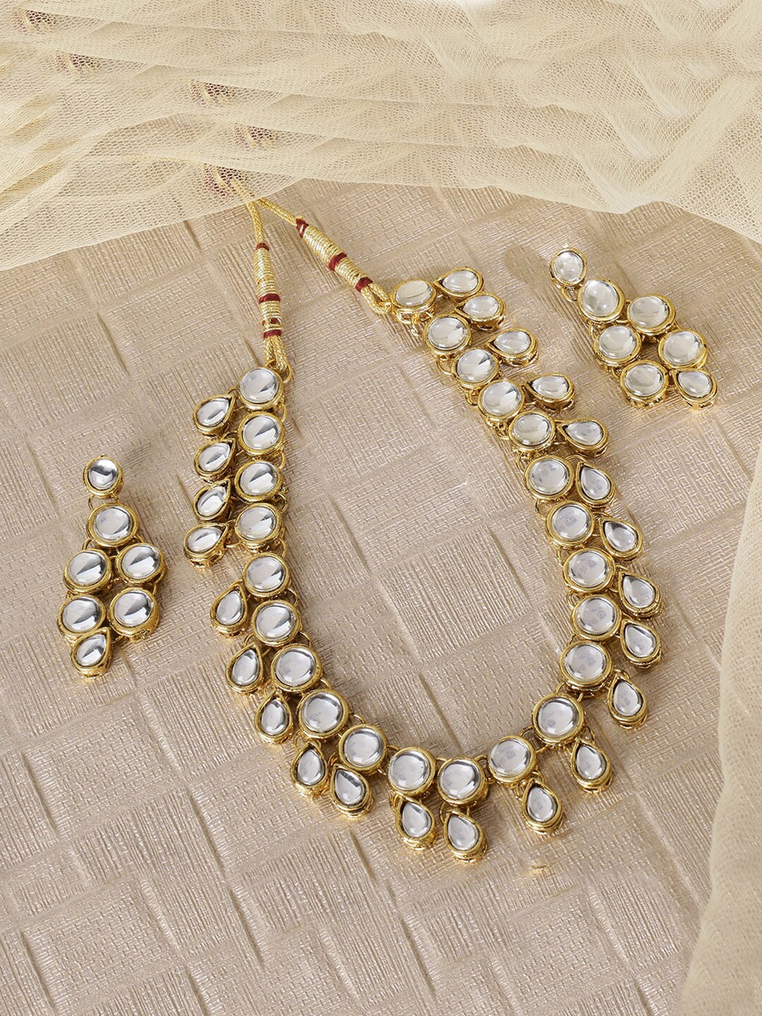 

LIVE EVIL Gold-Toned & White Gold Plated Kundan Jadau Jewellery Set