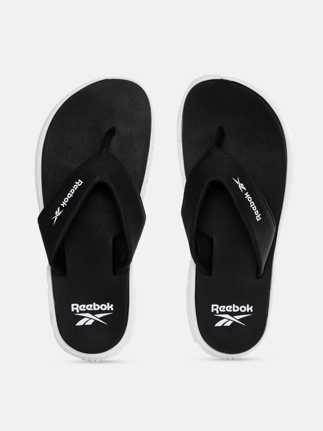 

Reebok Men Black & White Brand Logo Print Thong Flip-Flops