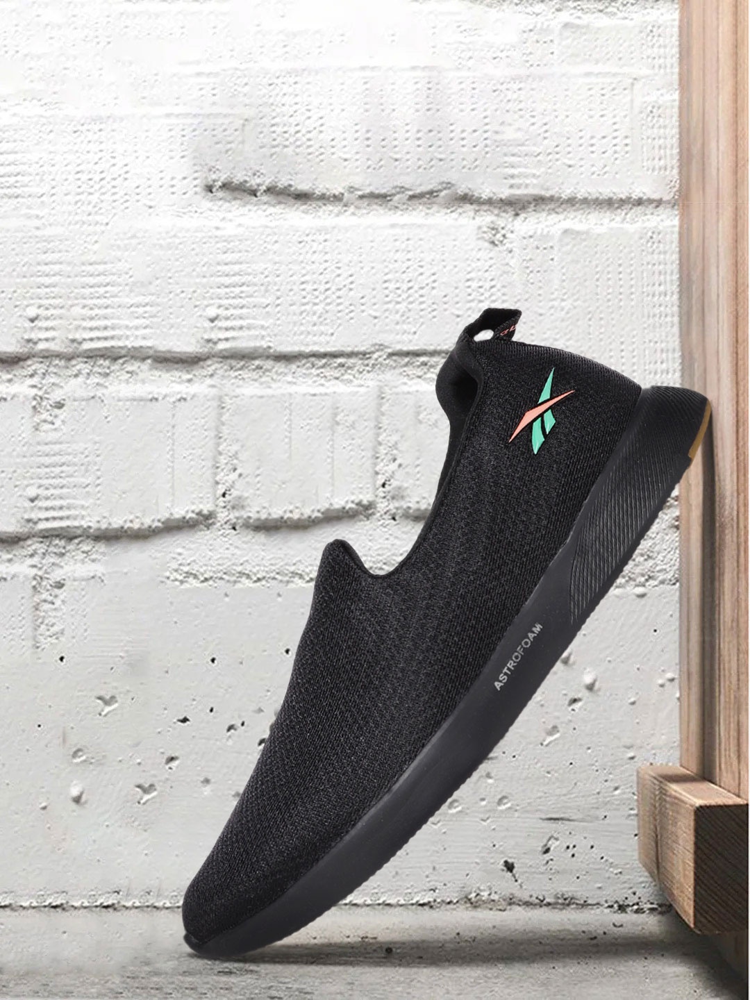 

Reebok Men Black Woven Design Out Bound Slip On Walking Shoes