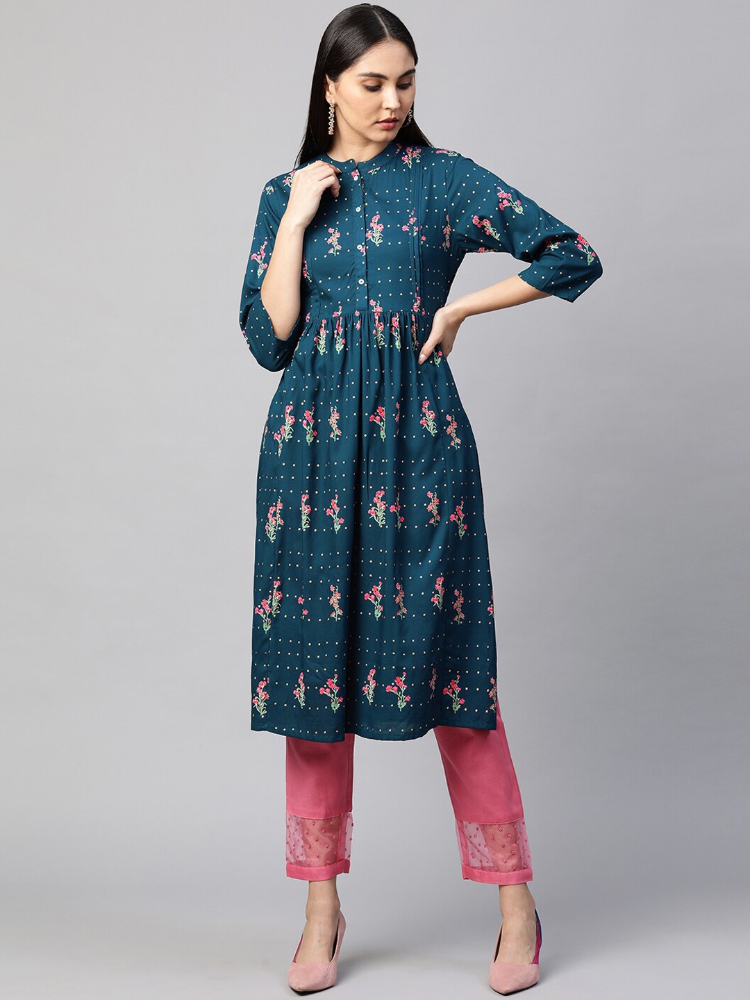 

FASHOR Women Teal Floral Printed Flared Sleeves Kurta
