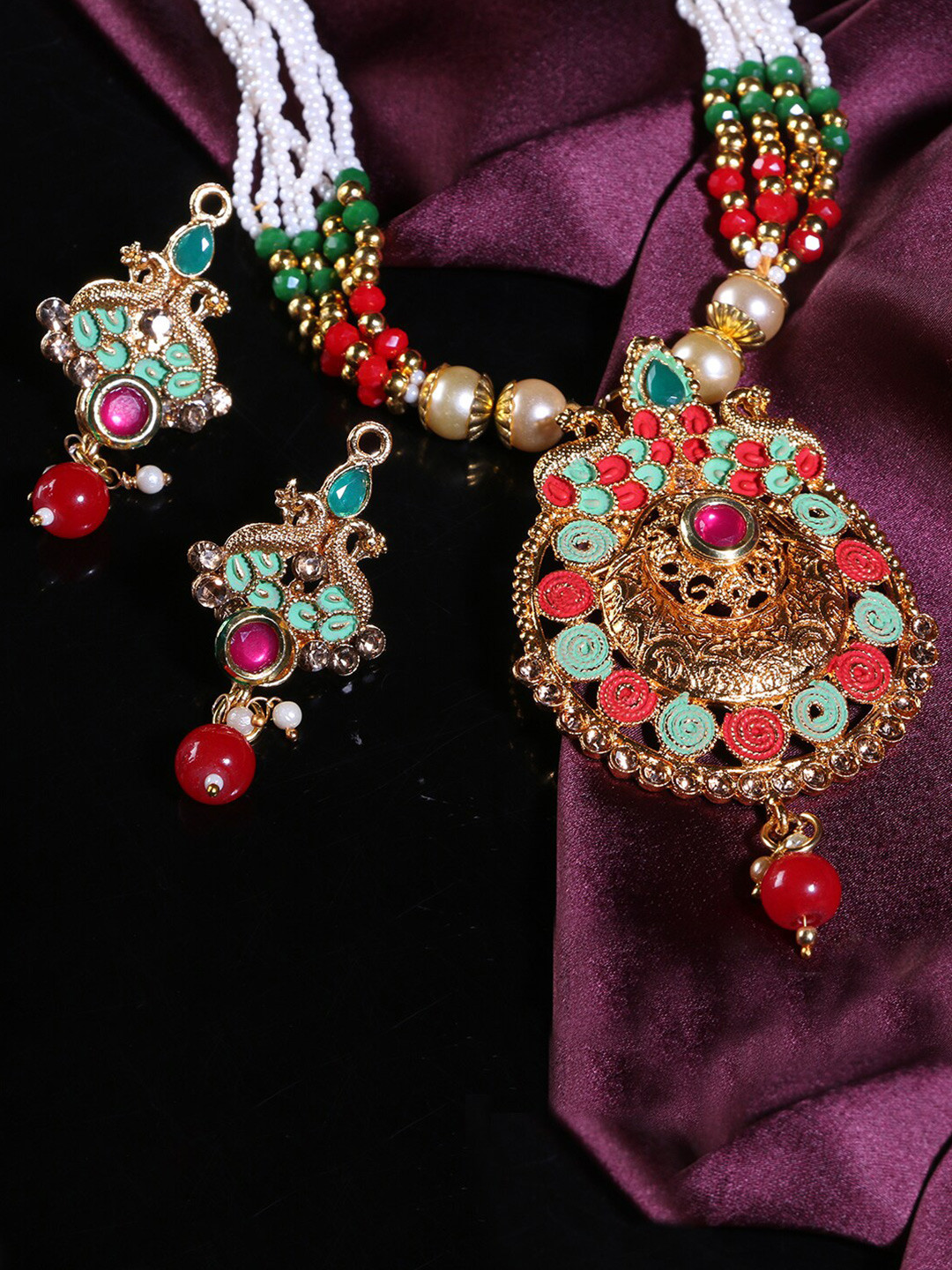 

LIVE EVIL Gold-Plated & Pink Kundan Studded & Beaded Jewellery Set