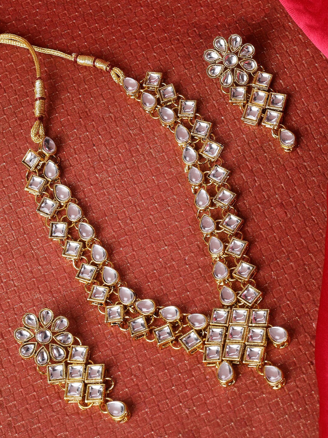 

LIVE EVIL Transparent & Gold-Plated Kundan Studded Jewellery Set