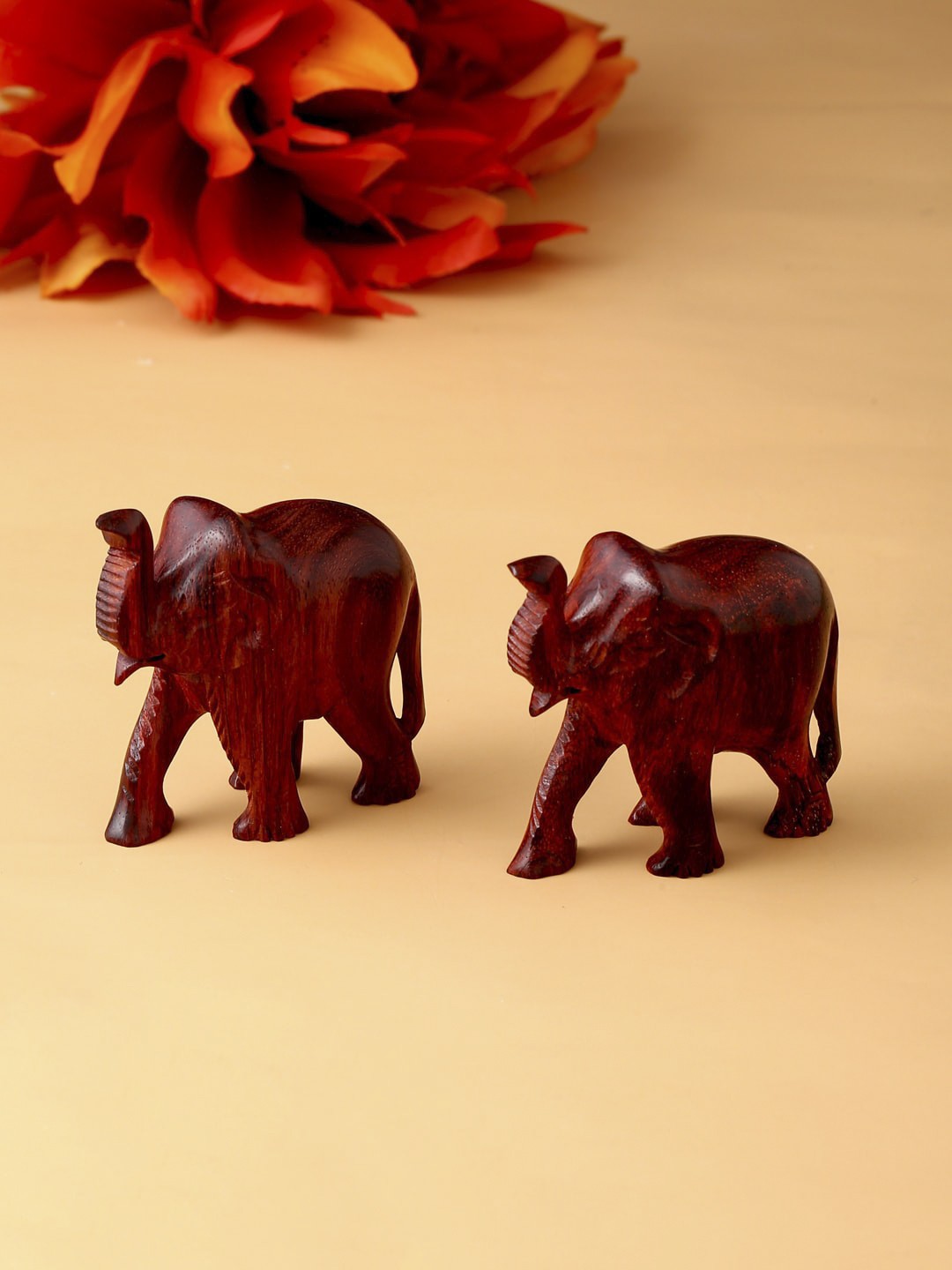 

RDK Red Set of 2 Handcrafted Upper Trunk Sandalwood Elephants Showpieces