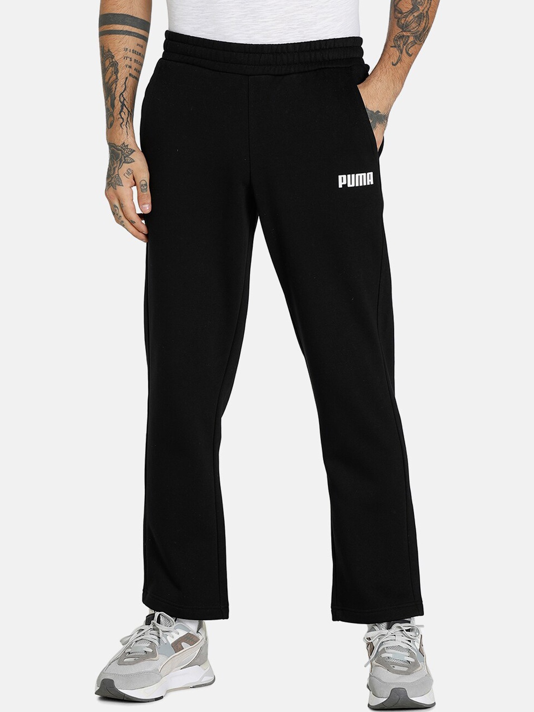 

Puma Men Black Solid Essentials Regular Fit Knitted Track Pants