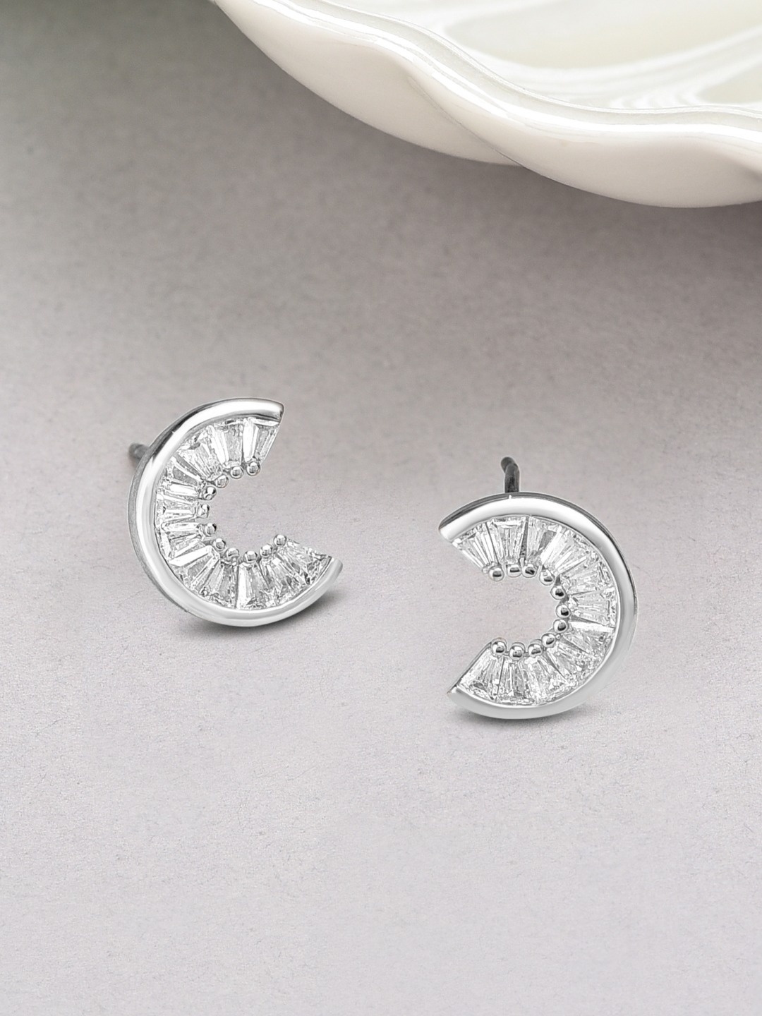 

AMI Silver-Plated Baguette Diamond Studded Contemporary Studs Earrings