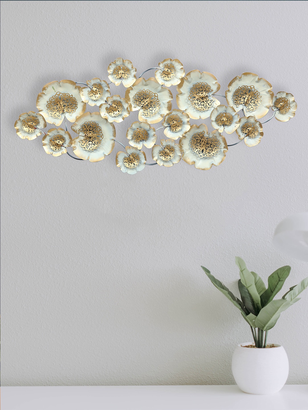 

Aapno Rajasthan Gold-Toned & White Side Contemporary Antique Wall Decor