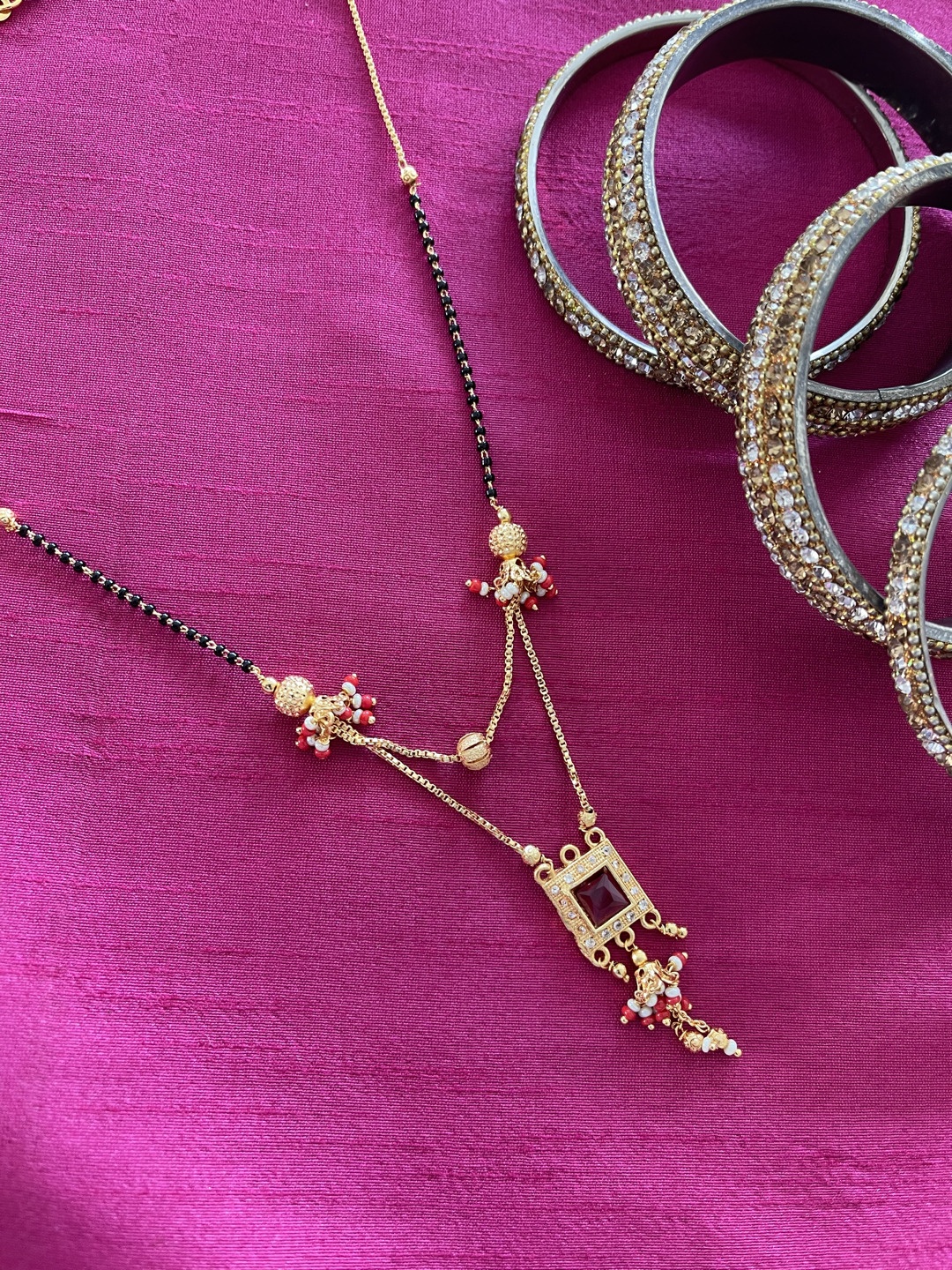 

Digital Dress Room Gold-Plated Red & Black Stone-Studded & Beaded Managalsutra