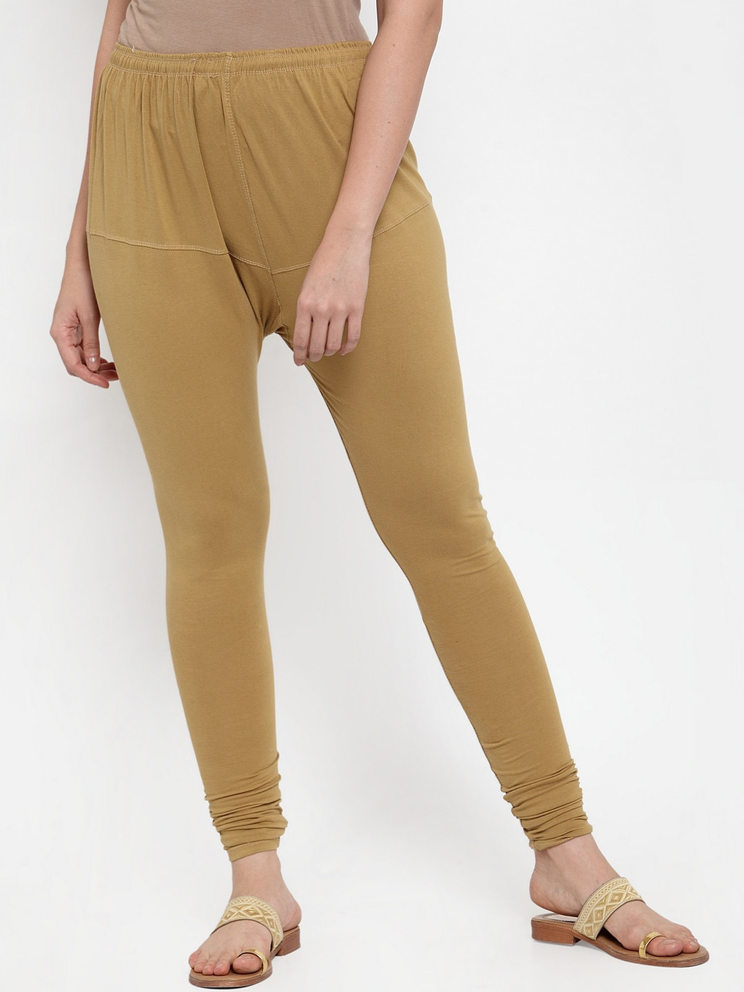 

Jompers Women Beige Solid Slim-Fit Churidar-Length Leggings