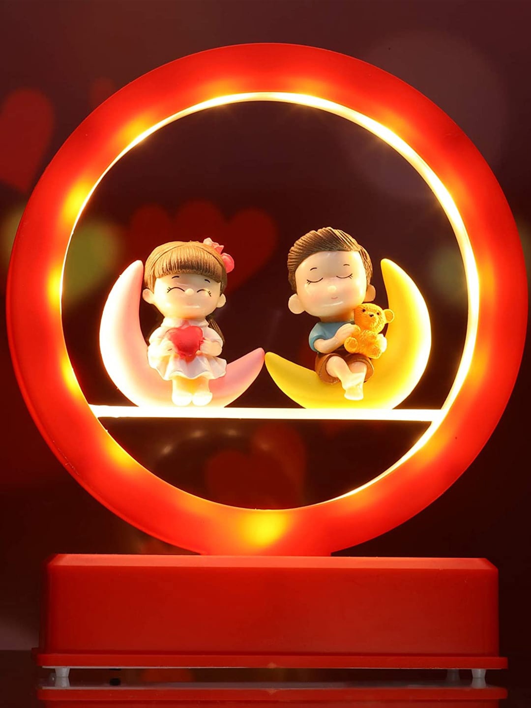 

TIED RIBBONS Red & Brown Couples Led Light Showpiece