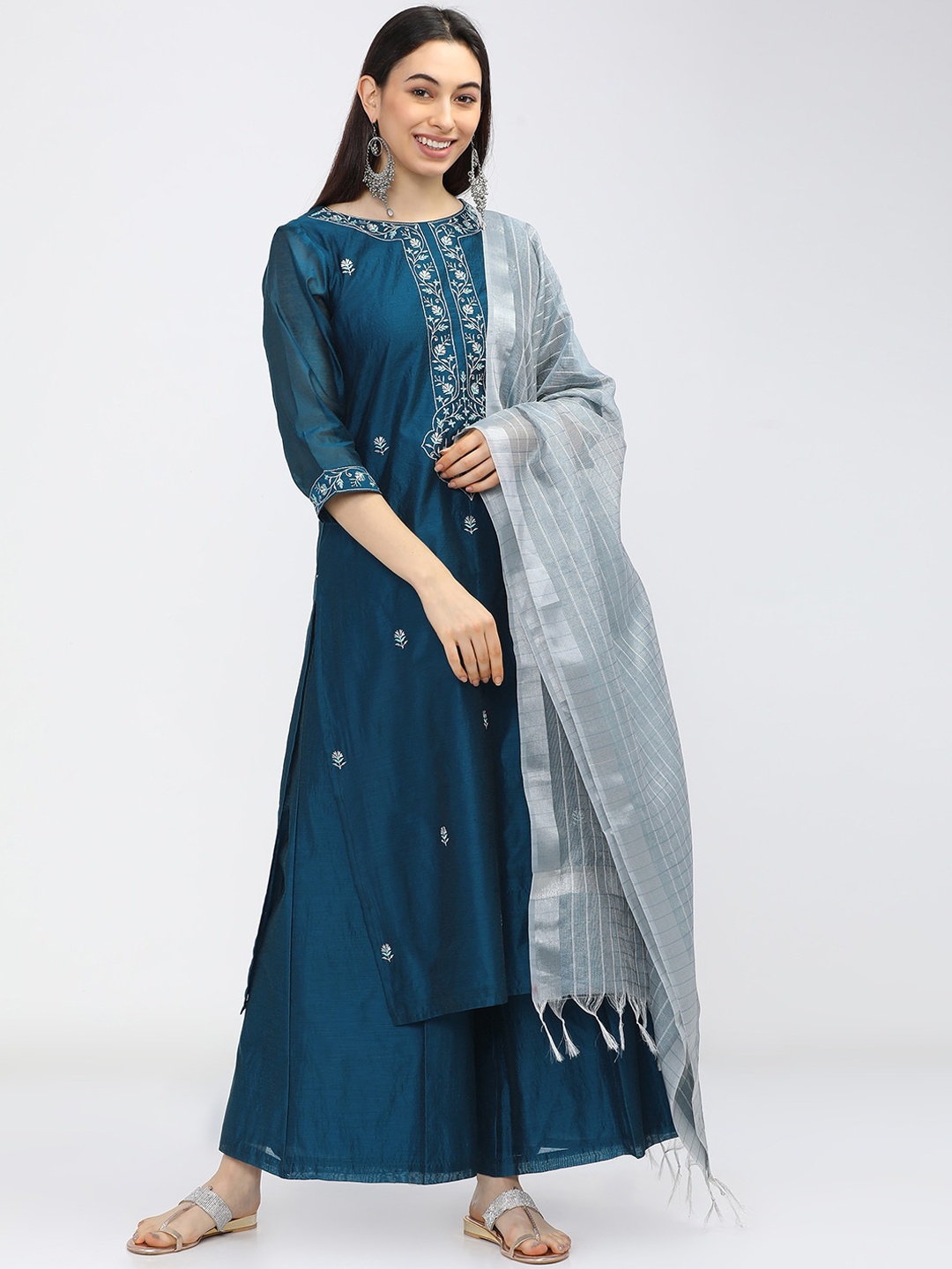 

Vishudh Women Teal Floral Embroidered Kurta with Palazzos & With Dupatta