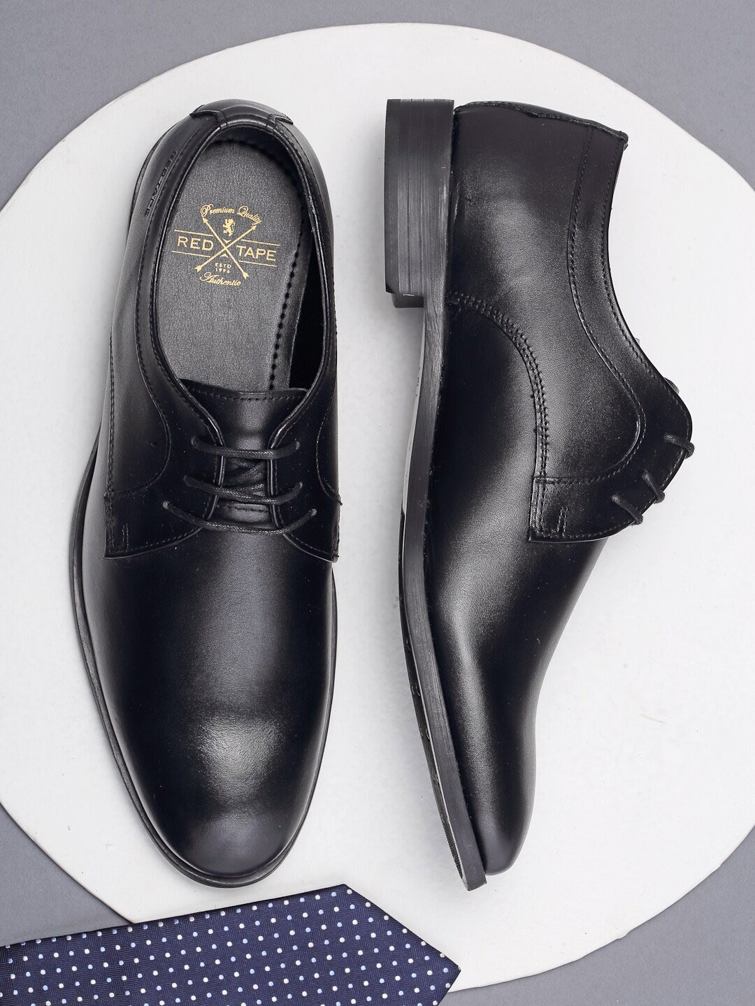 

Red Tape Men Black Solid Leather Formal Derbys