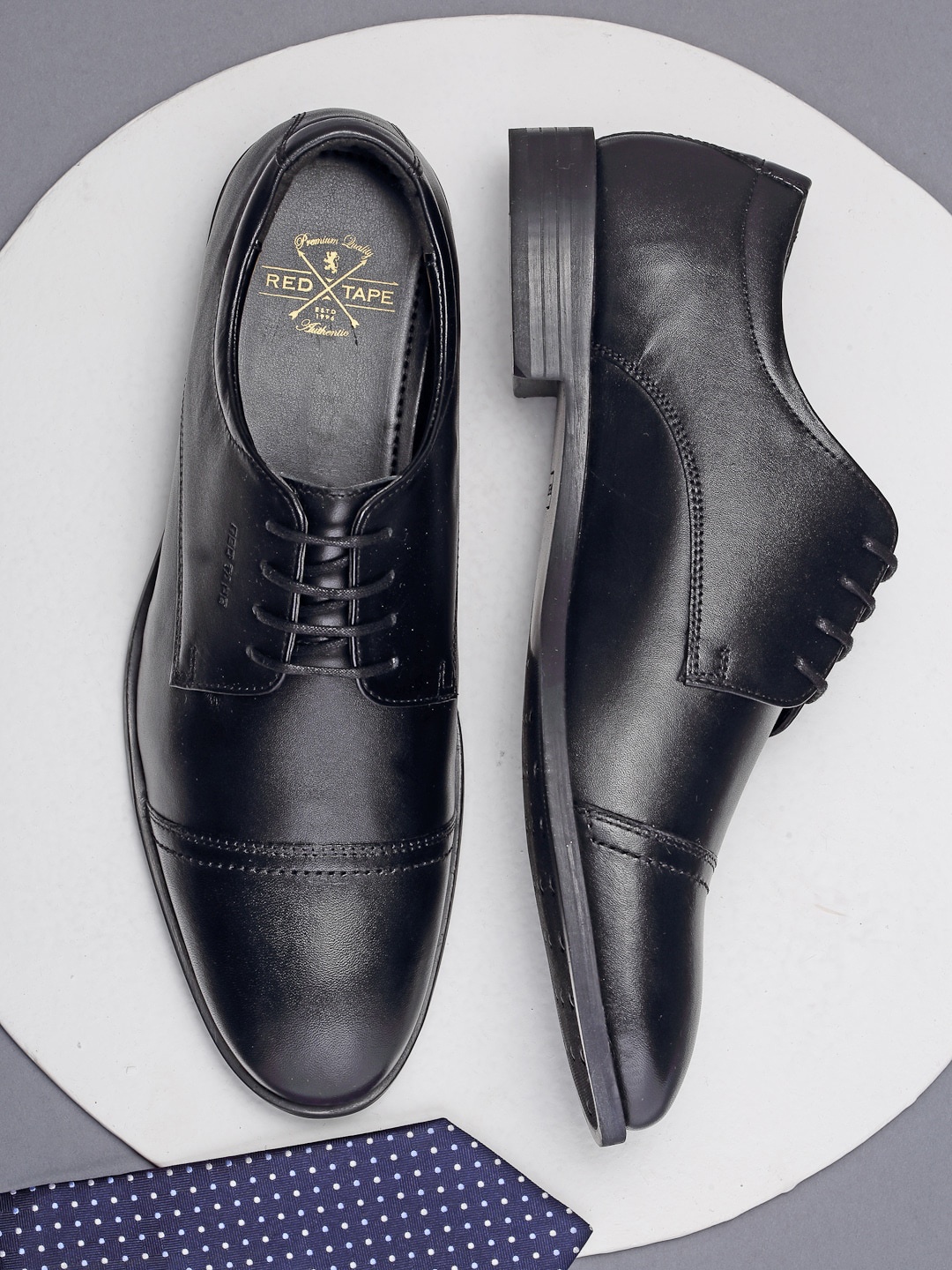 

Red Tape Men Black Solid Leather Formal Derbys
