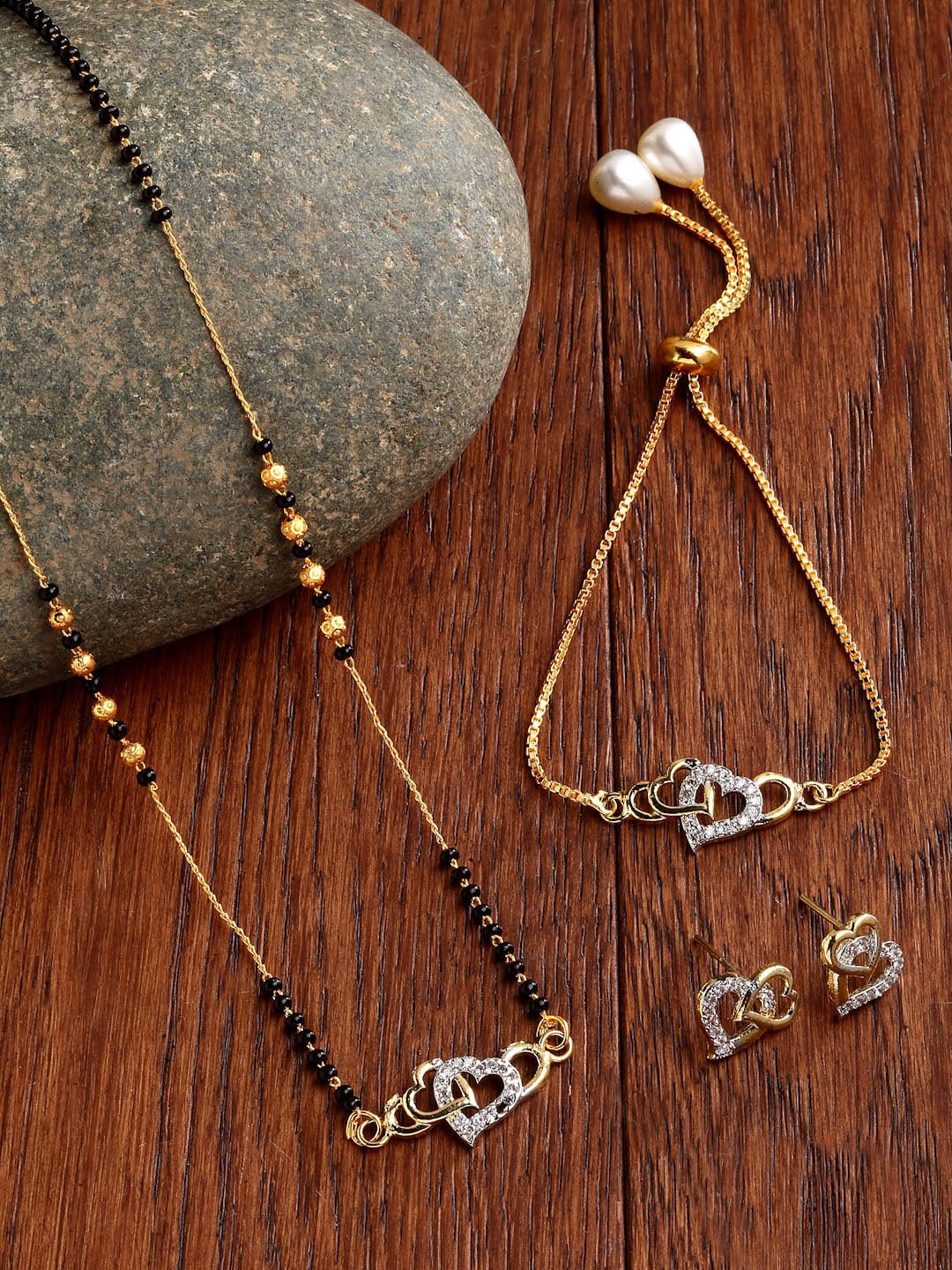 

ZENEME Gold-Plated & White AD-Studded & Beaded Heart Shaped Mangalsutra Set