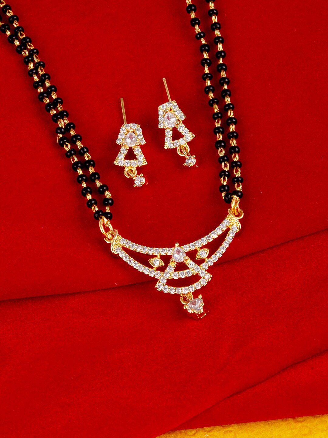 

Voylla White & Black Gold-Plated AD CZ Traditional Beaded Mangalsutra With Earrings