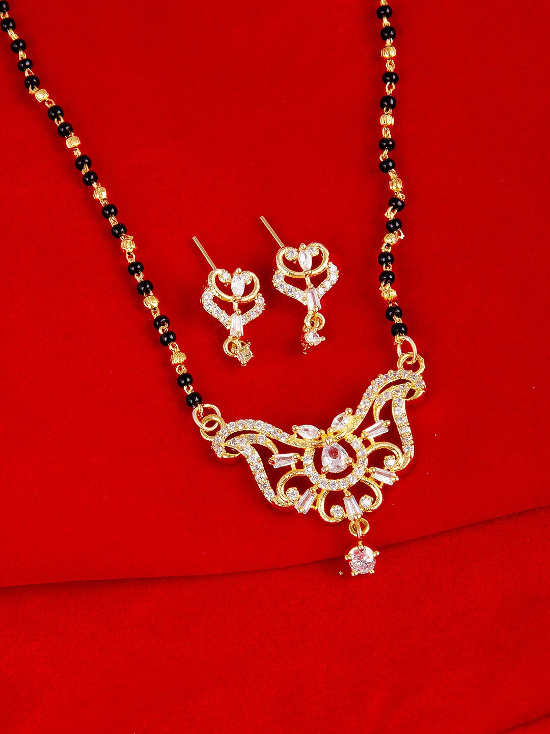 

Voylla White & Black Gold-Plated AD CZ Traditional Beaded Mangalsutra With Earrings