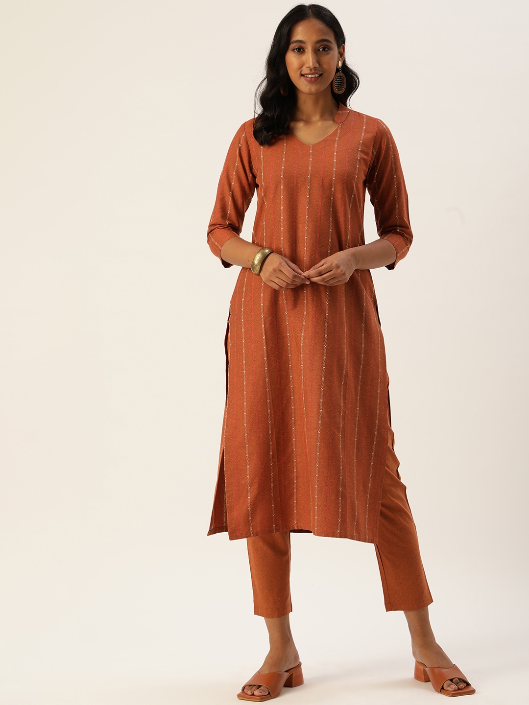 

Saanjh Women Rust Cotton Blend Woven Designed Straight Kurti with Trousers