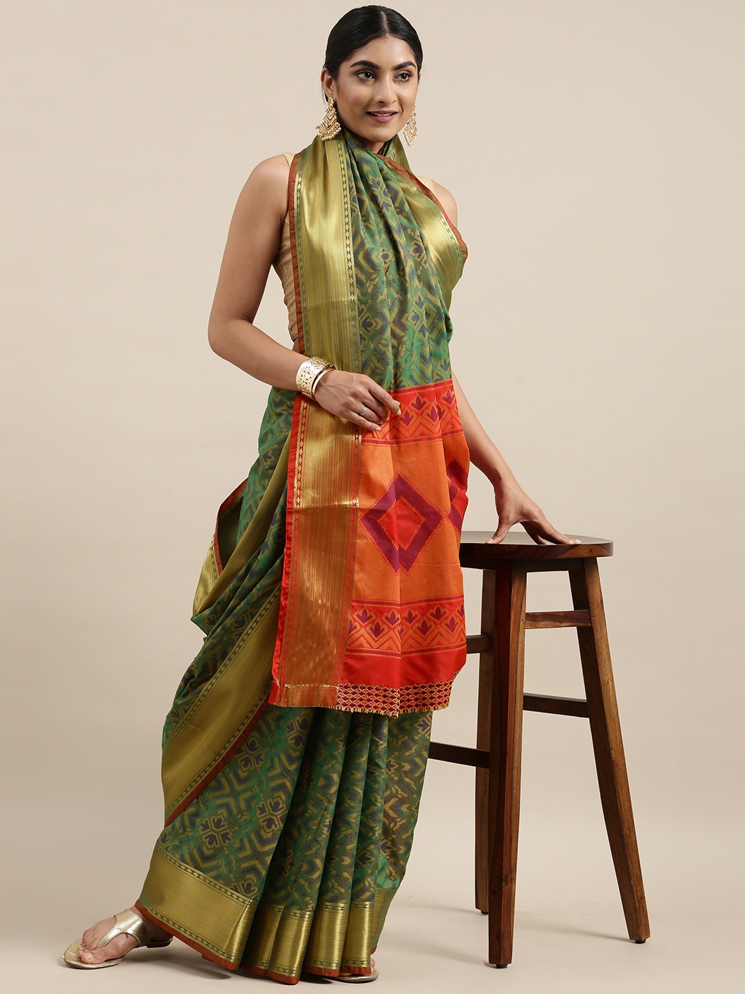 

Mitera Olive Green & Golden Ethnic Woven Design Zari Patola SilkSaree