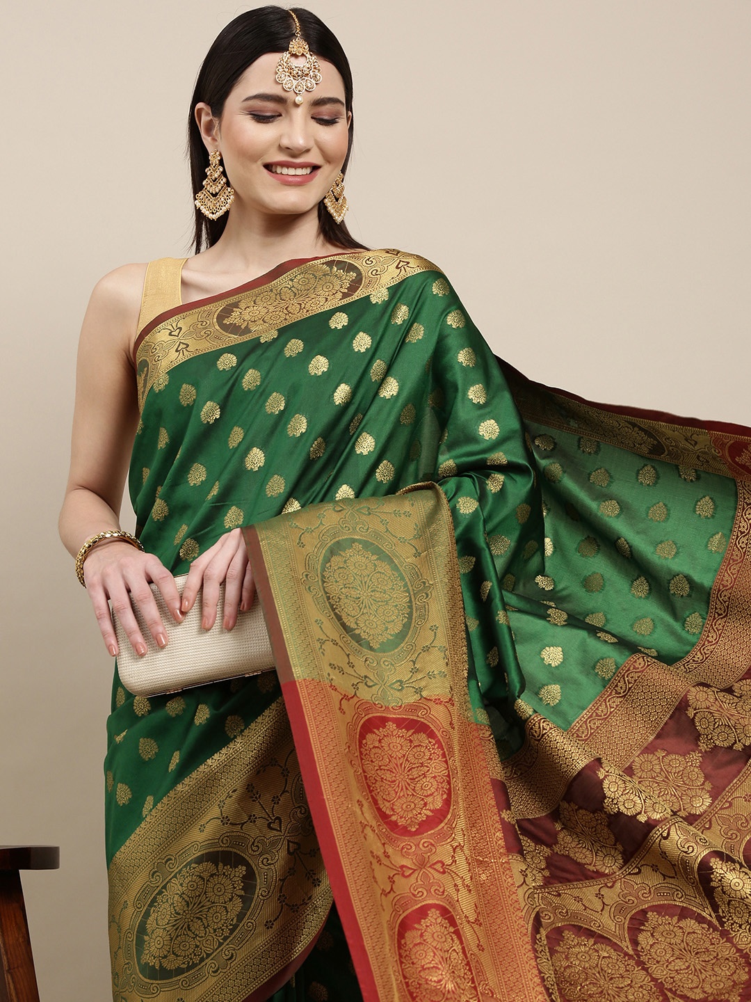

Mitera Green & Golden Ethnic Motifs Banarasi Saree with Zari Border