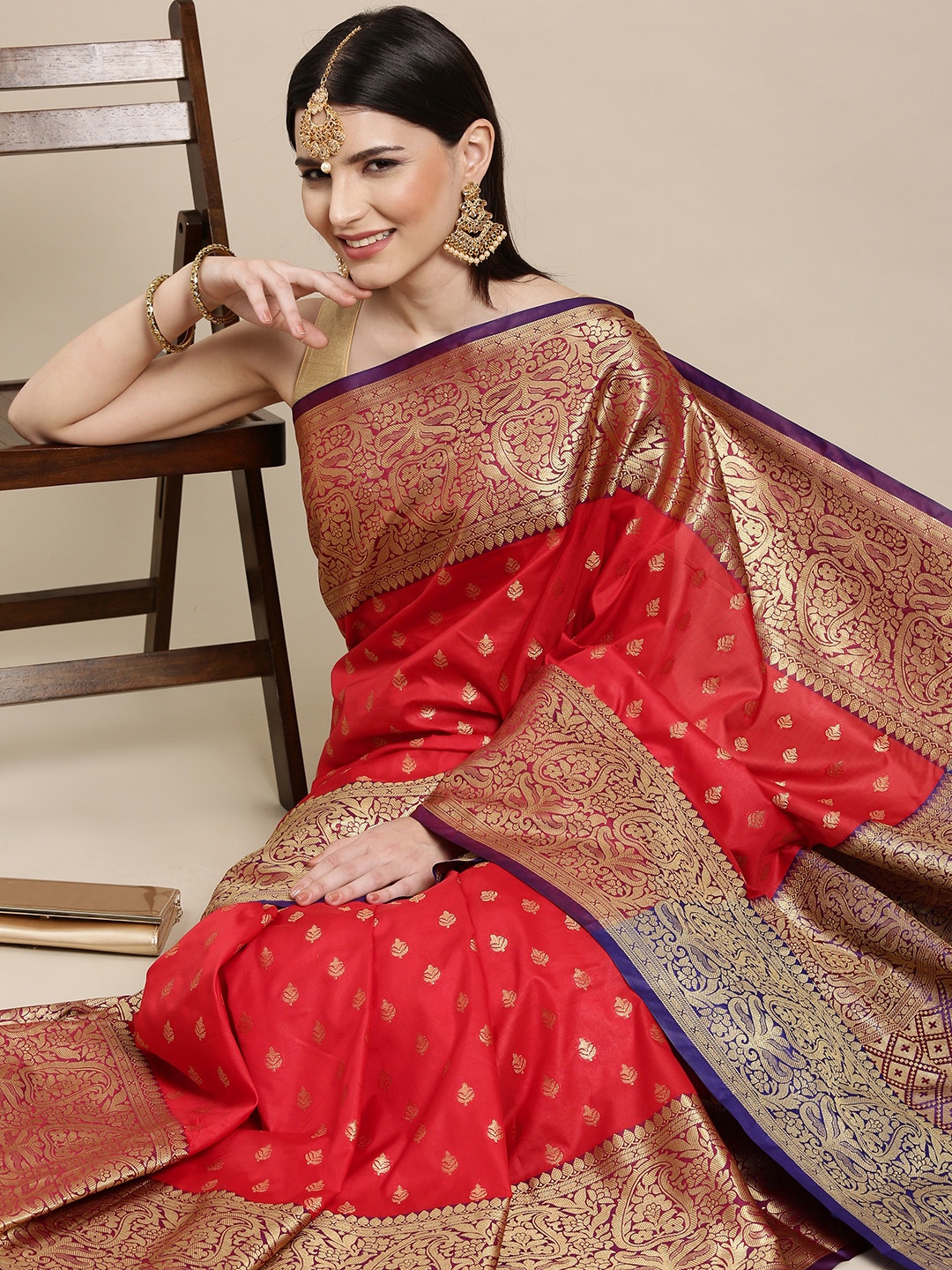 

Mitera Red & Golden Ethnic Motifs Banarasi Saree with Zari Border