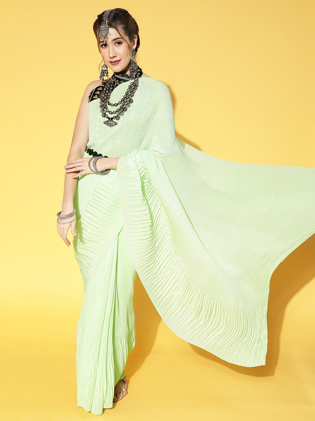 

Saree mall Green & Black Solid Party Saree with Matching Blouse