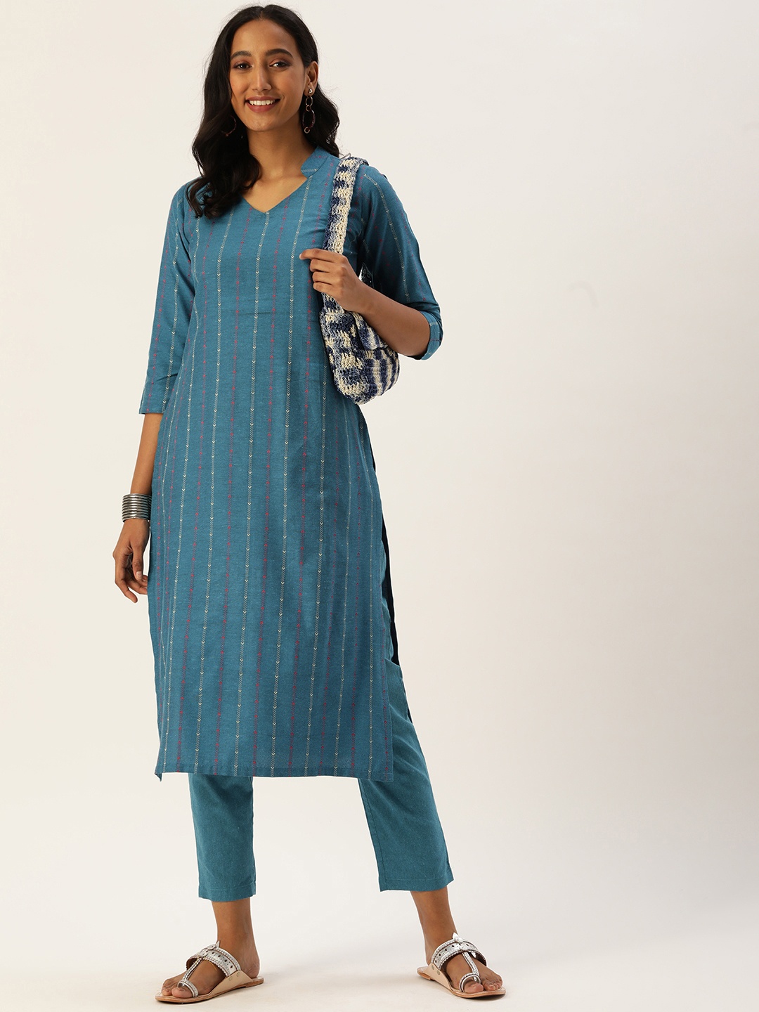 

Saanjh Women Blue Cotton Blend Woven Designed Straight Kurti with Trousers