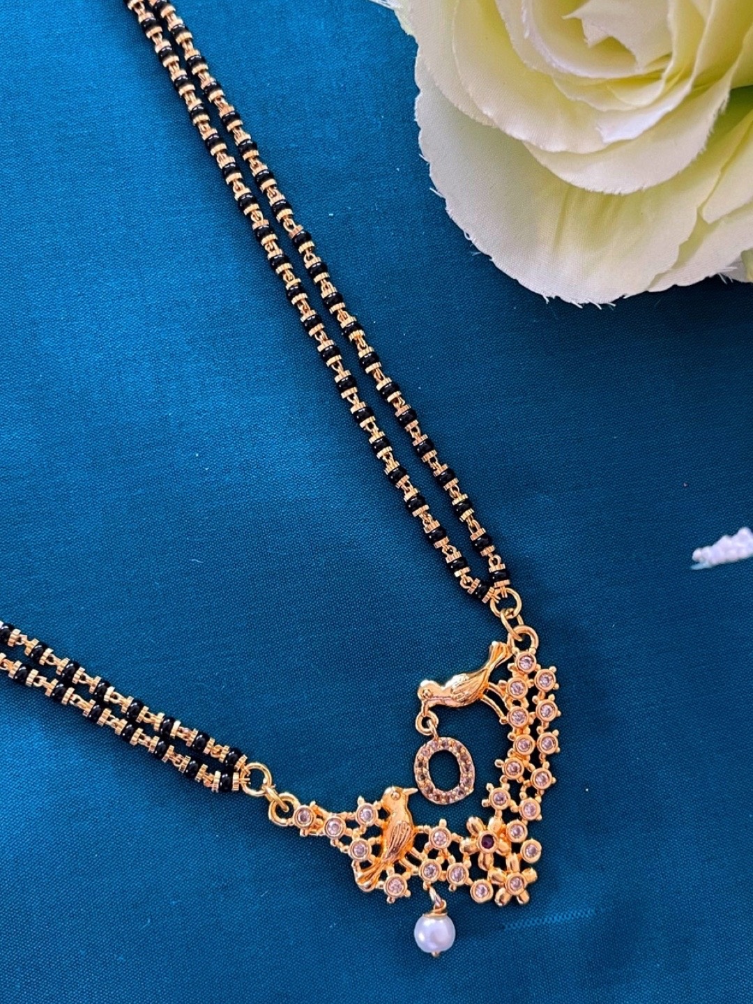 

Digital Dress Room Gold-Plated Black & White Stone Studded & Beaded Mangalsutra