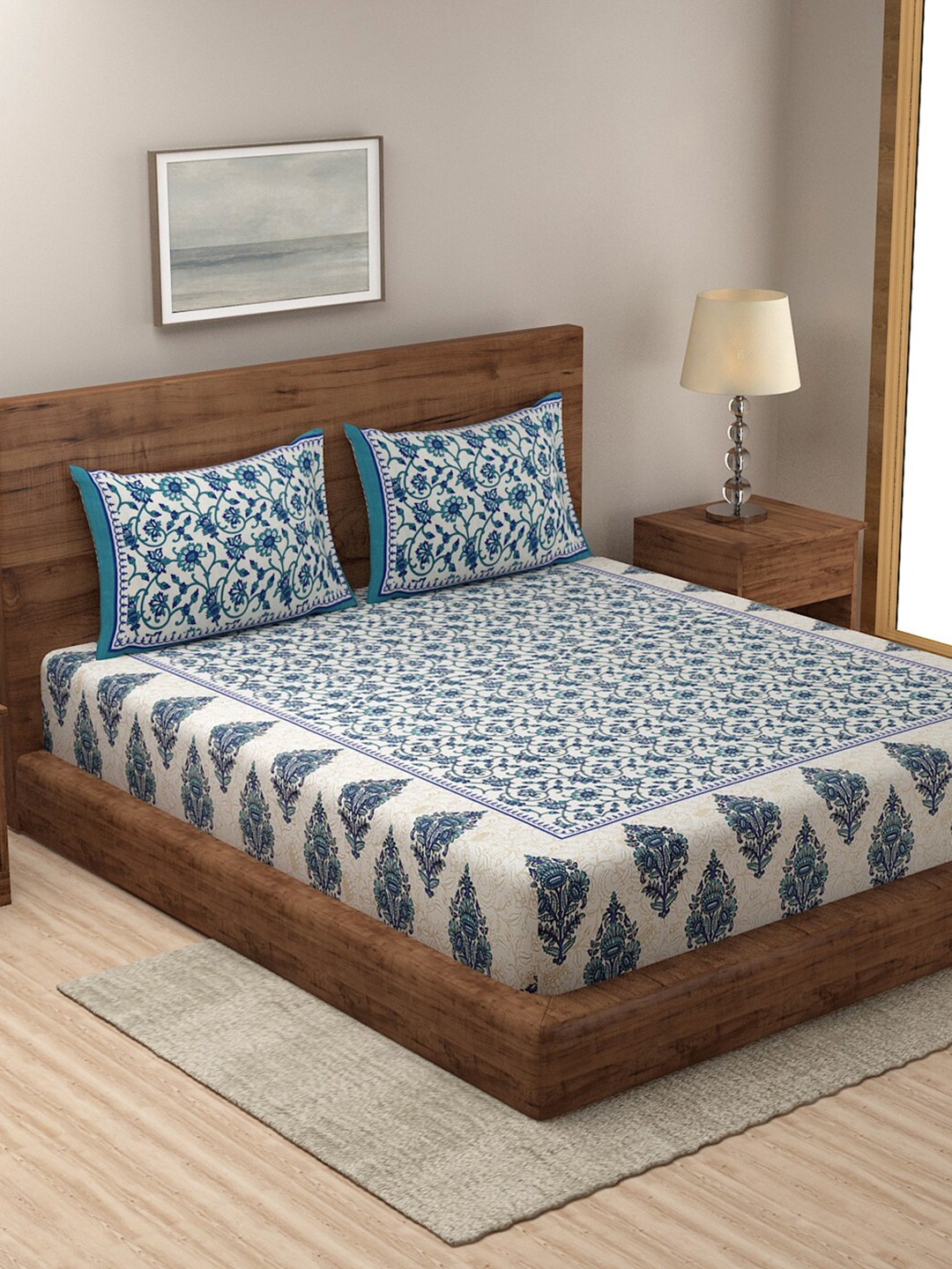 

Rajasthan Decor White & Blue Floral 144 TC Queen Bedsheet with 2 Pillow Covers