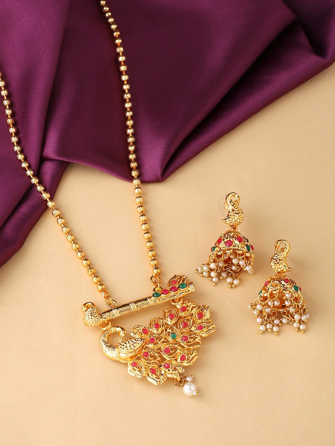 

Yellow Chimes Gold-Plated Kundan Studded & Beaded Peacock Design Oxidised Jewelry Set