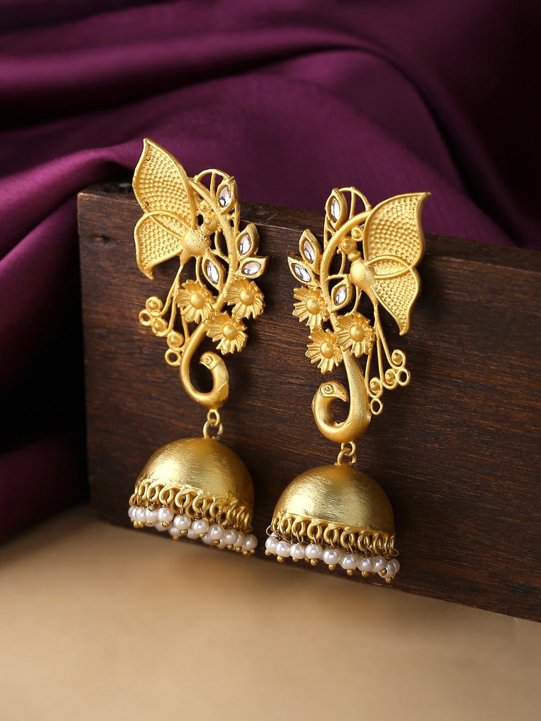 

Yellow Chimes Gold-Plated Dome Shaped Jhumkas Earrings