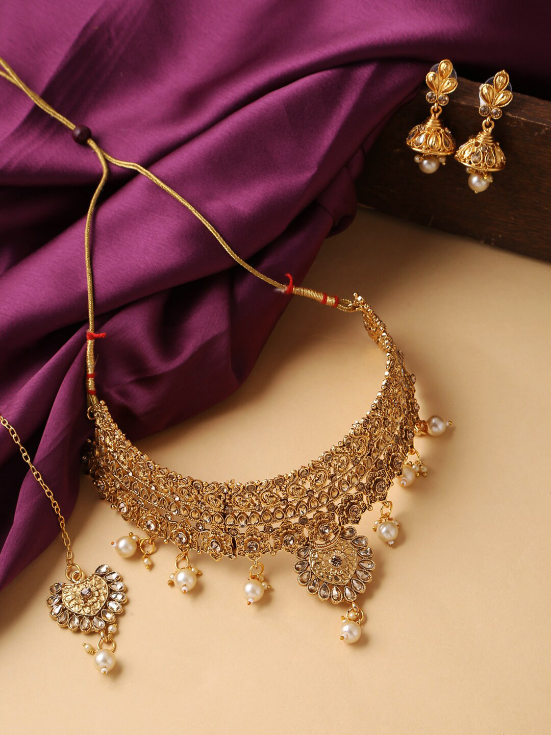 

Yellow Chimes Gold-Plated White Kundan-Studded & Pearl Beaded Oxidised Jewellery Set