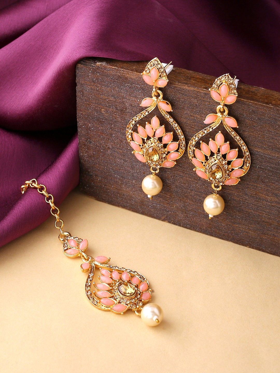 

Yellow Chimes Woman Gold-Plated Pink Stone-Studded Leaf Design Earrings With Maangtikka