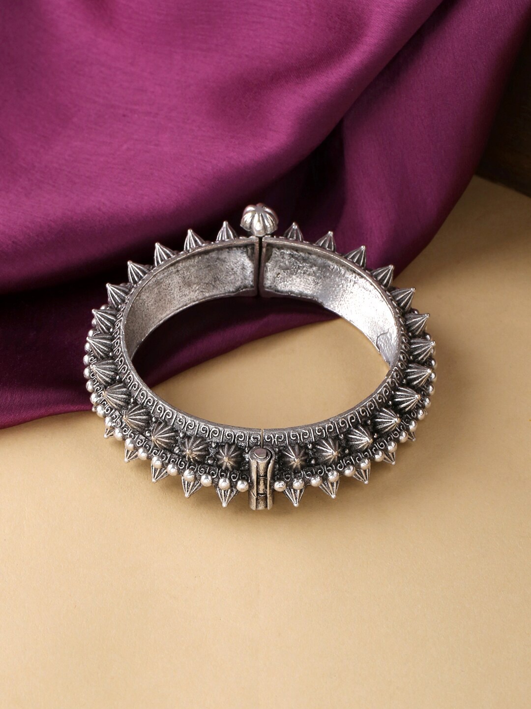 

Yellow Chimes Women Oxidised Silver-Plated Bangle-Style Bracelet