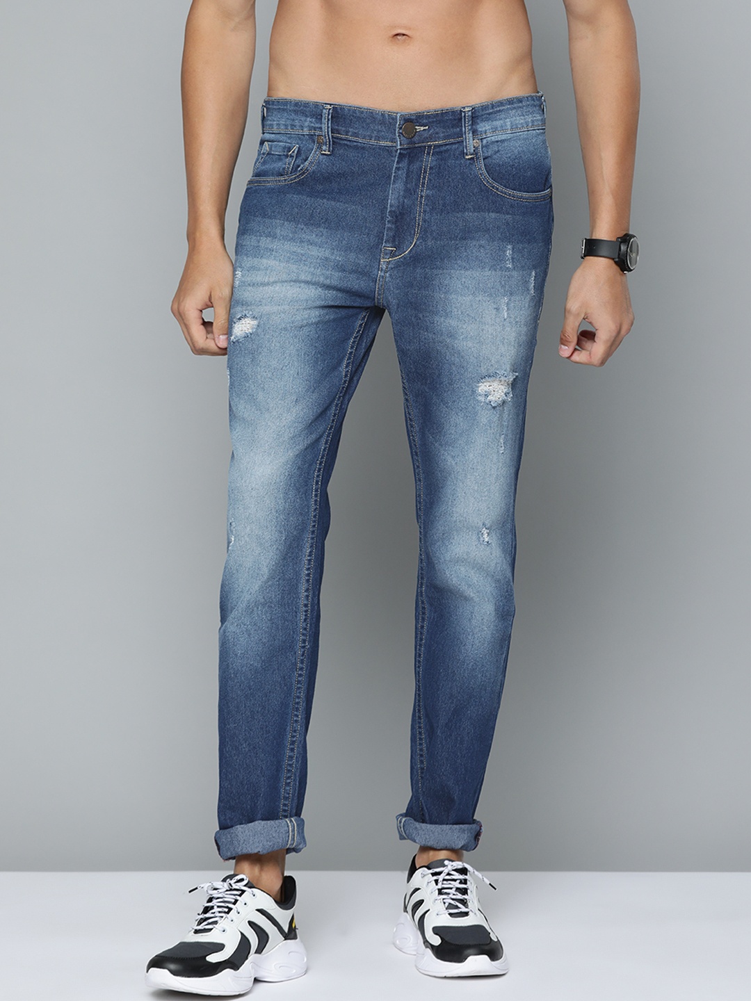 

HERE&NOW Men Blue Slim Fit Mildly Distressed Light Fade Stretchable Jeans