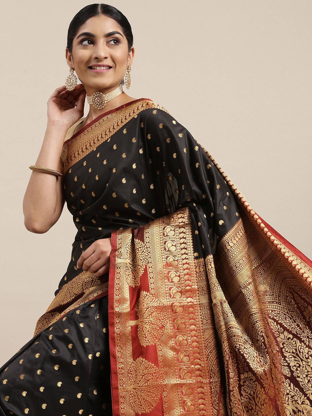 

Mitera Black & Golden Paisley Design Zari Banarasi Silk Saree