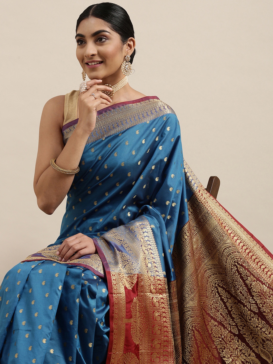 

Mitera Blue & Golden Paisley Design Zari Banarasi Silk Saree