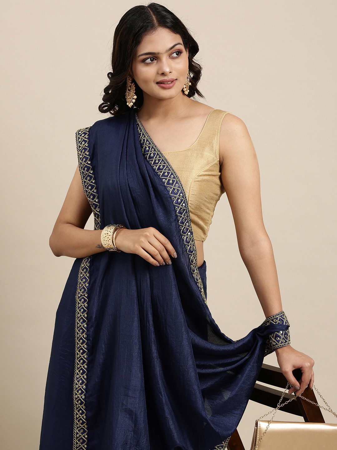

Mitera Navy Blue Solid Saree wtih Embroidered Border