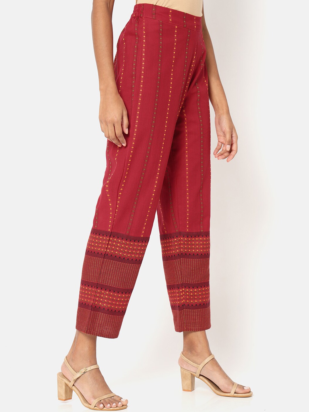 

Saaki Women Red Printed Tapered Fit Trousers
